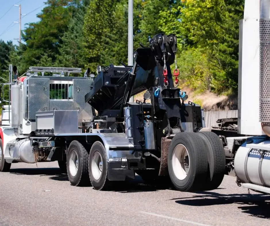 heavy-duty wrecker on a Buckingham highway shoulder